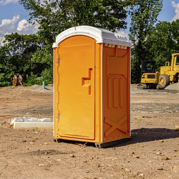 how often are the portable toilets cleaned and serviced during a rental period in Combee Settlement